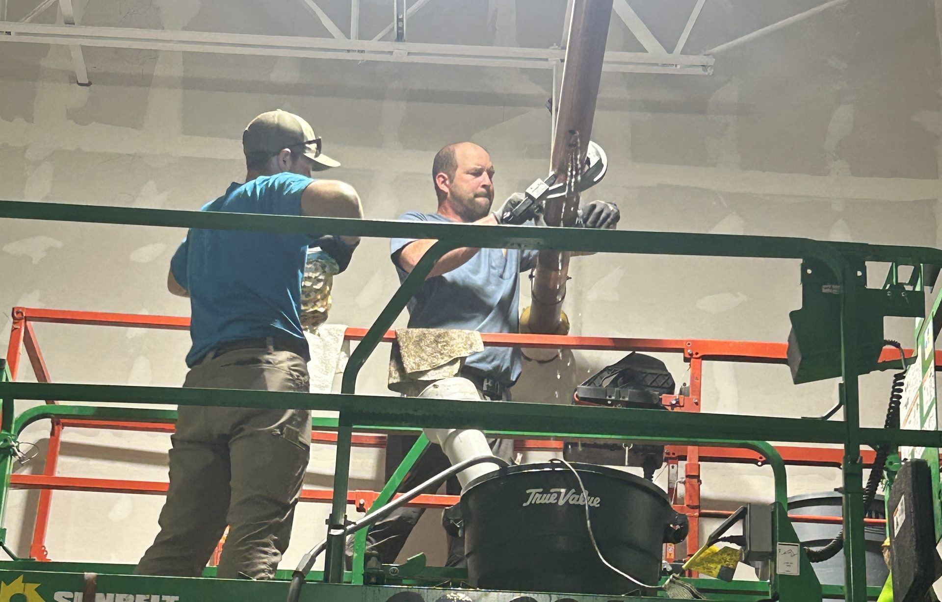 Plumber repairing copper riser